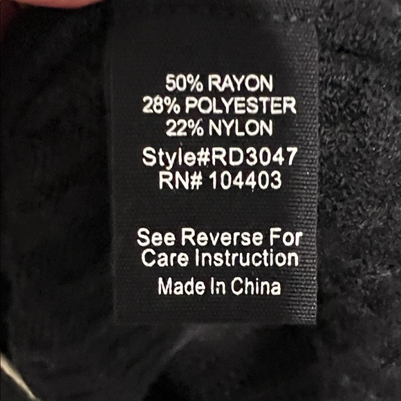 Chic Black Long Sleeve Sweater Dress with White Accents - Picture 6 of 7